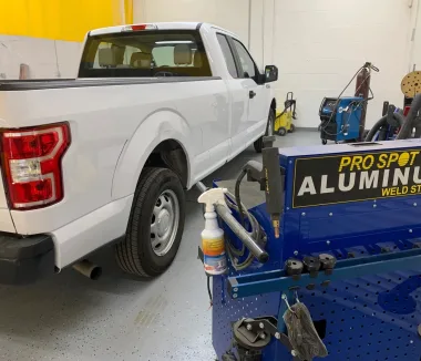Ford F-150 at the Pro Spot aluminum welding station for OEM-spec aluminum body repair